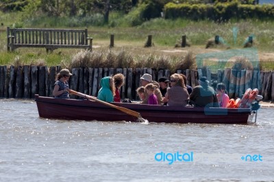 People Using The Ferry In Southwold Stock Photo