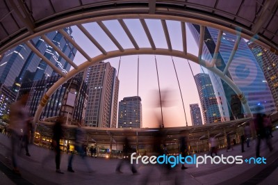 People Walking In Urban Landscape Stock Photo