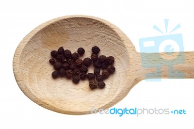 Pepper Seeds On Wooden Spoon Stock Photo