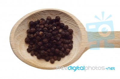 Pepper Seeds On Wooden Spoon Stock Photo