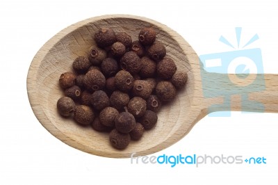 Pepper Seeds On Wooden Spoon Stock Photo