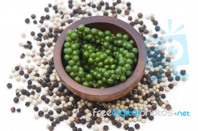 Peppercorn, Young Pepper, Green Peppercorn. Fresh Organic Harvest On Wood Bowl Stock Photo