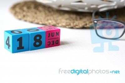 Perpetual Calendar Set At The Date Of June 18 Stock Photo