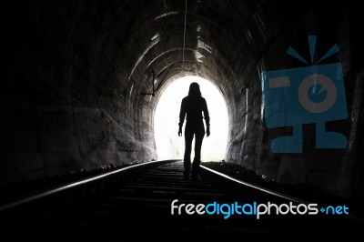 Person At End Of Tunnel Stock Photo