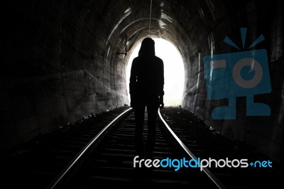 Person At End Of Tunnel Stock Photo