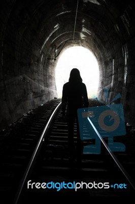 Person At End Of Tunnel Stock Photo