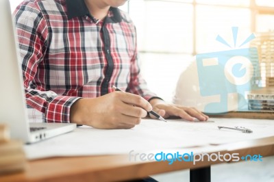 Person's Engineer Hand Drawing Plan On Blue Print With Architect… Stock Photo