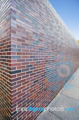 Perspective Of Tall Brick Wall Stock Photo