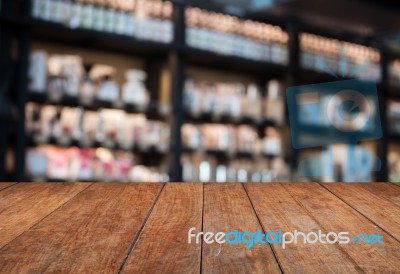 Perspective Top Wooden With Blurred Cafe Background Stock Photo