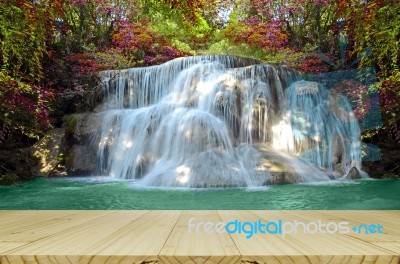 Perspective Window View Of Waterfall With Autumn Forest Stock Photo