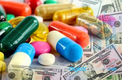 Pharmaceutical Business And Dollars Bank Note Stock Photo