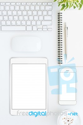 Phone And Tablet Blank Screen On White Table Format Vertical Top… Stock Photo