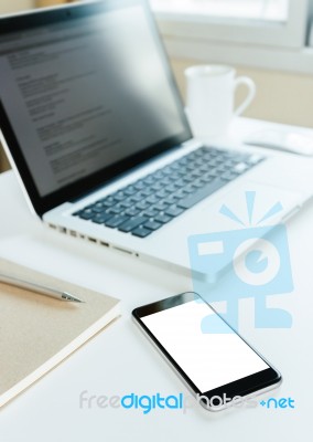 Phone Blank Screen On Workspace Table Stock Photo