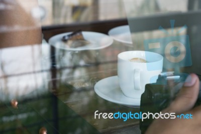 Photos From Outside Coffee Shop Focus On Coffee Cup Stock Photo