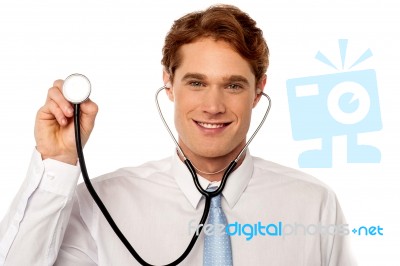 Physician Posing Withstethoscope Stock Photo