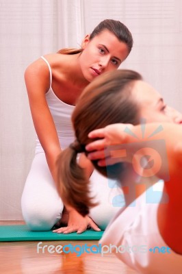 Physiotherapy Exercise On Carpet Stock Photo