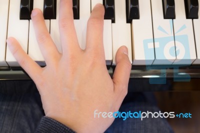 Piano Player Play The Music Stock Photo