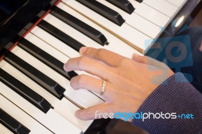 Piano Player Play The Music Stock Photo