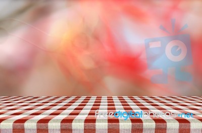 Picnic Table With Blurred Autumn Leaves Background Stock Photo