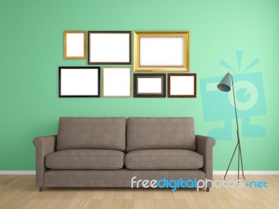 Picture Frame On Wall And Sofa Interior Furniture Design Stock Image