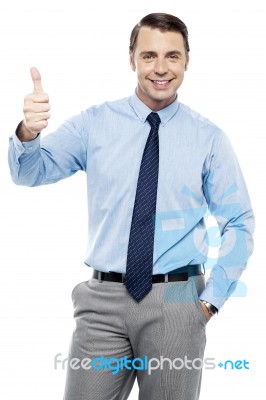 Picture Of A Male Executive Showing Thumbs Up Stock Photo