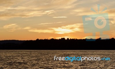 Picture With An Amazing Sunset On A Lake Stock Photo