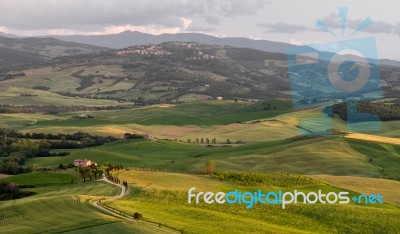 Pienza, Tuscany/italy - May 19 : Farmland Below Pienza In Tuscan… Stock Photo