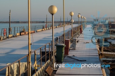 Pier In A Sunny Winter Day Stock Photo