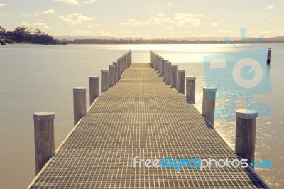 Pier On The Water In The Town Of Swansea, Tasmania Stock Photo