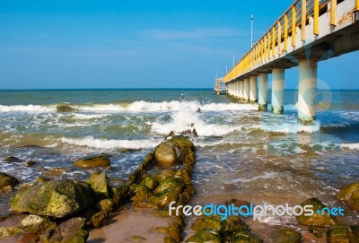 Pier Stretching Into The Sea Stock Photo