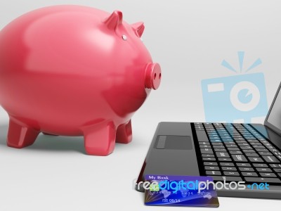 Piggy At Computer Shows Banking On Laptop Stock Image