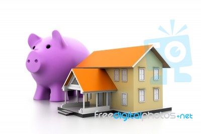 Piggy Bank And A House Model Stock Image