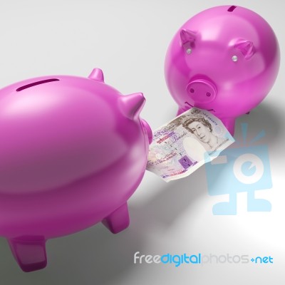 Piggybanks Fighting Over Money Showing Savings Stock Image