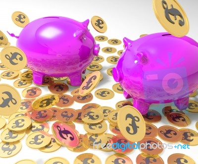 Piggybanks On Coins Showing Britain Incomes Stock Image