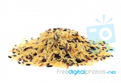 Pile Of Brown Rice Isolated On White Background Stock Photo