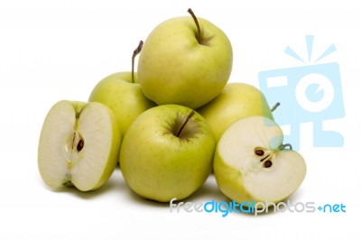 Pile Of Fresh And Healthy Yellow Apples Stock Photo