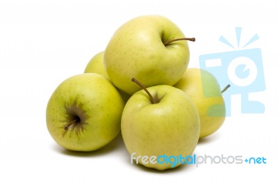 Pile Of Fresh And Healthy Yellow Apples Stock Photo