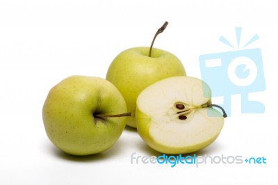 Pile Of Fresh And Healthy Yellow Apples Stock Photo