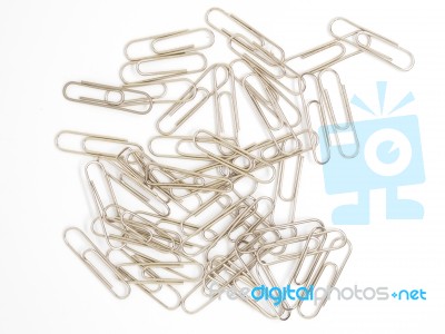 Pile Of Metal Paperclips Isolated Stock Photo