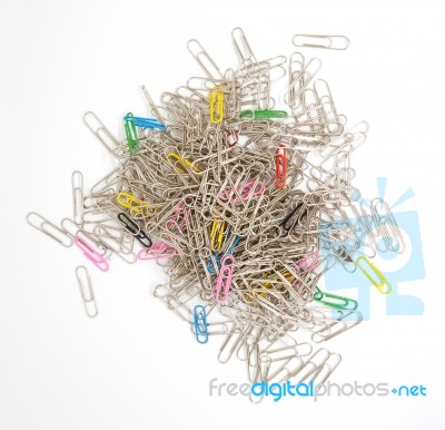 Pile Of Metal Paperclips Isolated Stock Photo