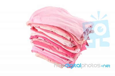 Pile Of Pink Shade Cloths On White Background Stock Photo