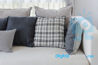 Pillows On Modern White Sofa In Living Room Stock Photo