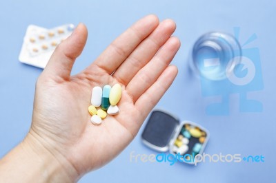 Pills In Hand Stock Photo