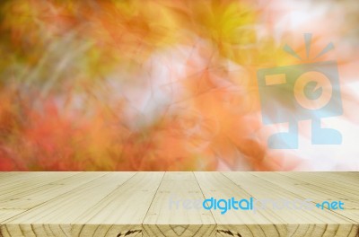 Pine Wood Counter With Blurred Autumn Leaves Background Stock Photo