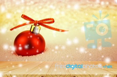 Pine Wood Table And Red Christmas Ball With Bokeh In Merry Metal… Stock Photo