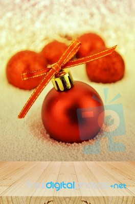 Pine Wood Table And Red Christmas Ball With Bokeh In Merry Metal… Stock Photo