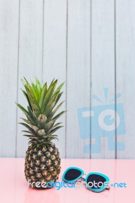 Pineapple On A Blue Pastel Background Stock Photo