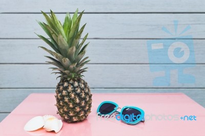 Pineapple On A Blue Pastel Background Stock Photo