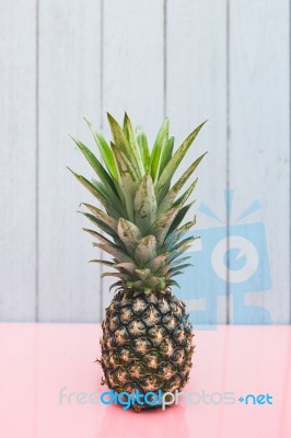 Pineapple On A Blue Pastel Background Stock Photo