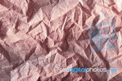 Pink Champagne Crumpled Glitter Paper Background Stock Photo